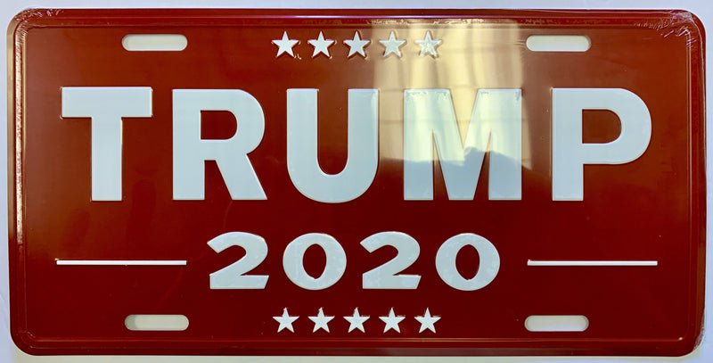 Assorted President Trump license plates and USA Collectors Set Auto Tags