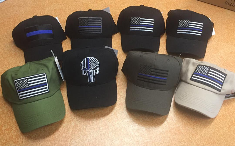 24 assorted POLICE CAPS